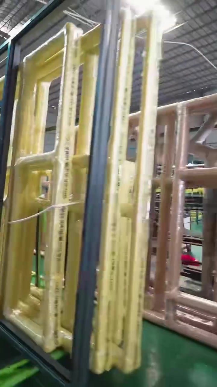 Finished aluminium window frames wrapped and stacked for assembly
